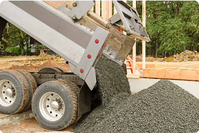 Aerial view of construction site with vehicles and equipment